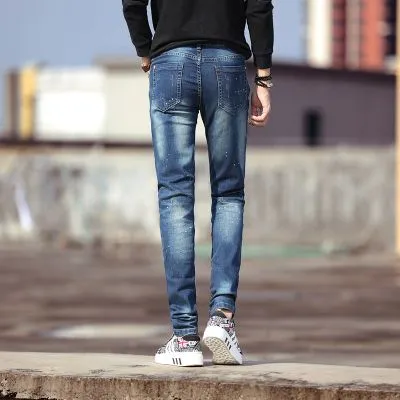 Jeans skinny pour homme avec effet éclaboussure de peinture blanche